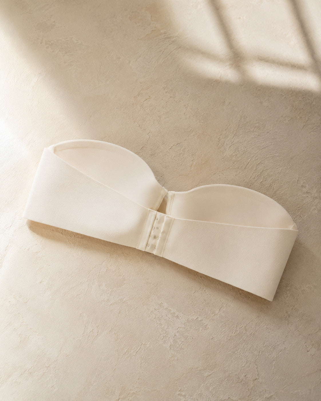 Ivory — three-quarter view on oat